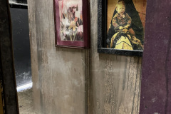 1_Eerie-Drop-Portrait-Hallway-Leading-To-Statue-Room