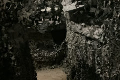 Exit-Of-Statue-Room-Vacuum-Form-Coffin-Panels-and-Camo-Netting